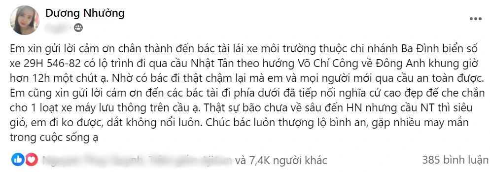 Người đi đường cảm ơn đoàn xe ô tô chắn gió bão Yagi trên cầu Nhật Tân