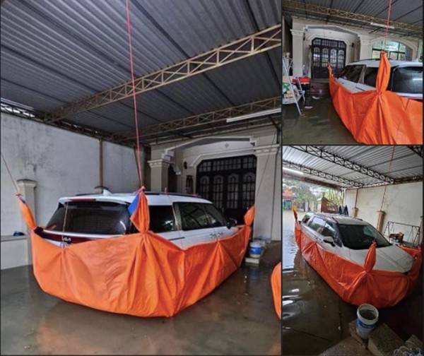 Người dân khu vực bị ảnh hưởng bão số 10, tìm mọi cách bảo vệ ô tô Người dân khu vực bị ảnh hưởng bão số 10, tìm mọi cách bảo vệ ô tô