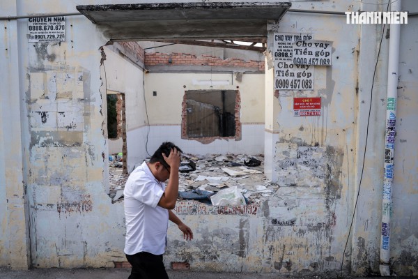 Người dân TP.HCM dỡ nhà, nhường đất mở rộng quốc lộ 13 Người dân TP.HCM dỡ nhà, nhường đất mở rộng quốc lộ 13