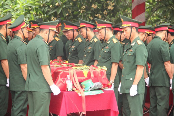 Truy điệu và an táng 87 hài cốt liệt sĩ được tìm thấy tại Lào