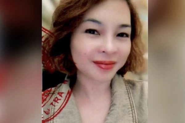 Đặng Thị Huệ bị truy tố vắng mặt