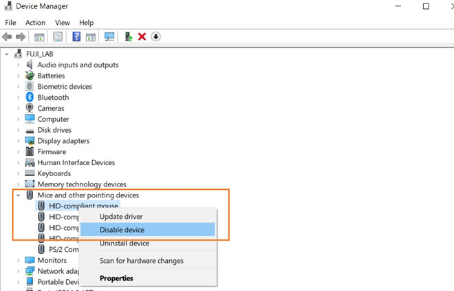 Làm thế nào để tắt bàn rê chuột tích hợp trên laptop?